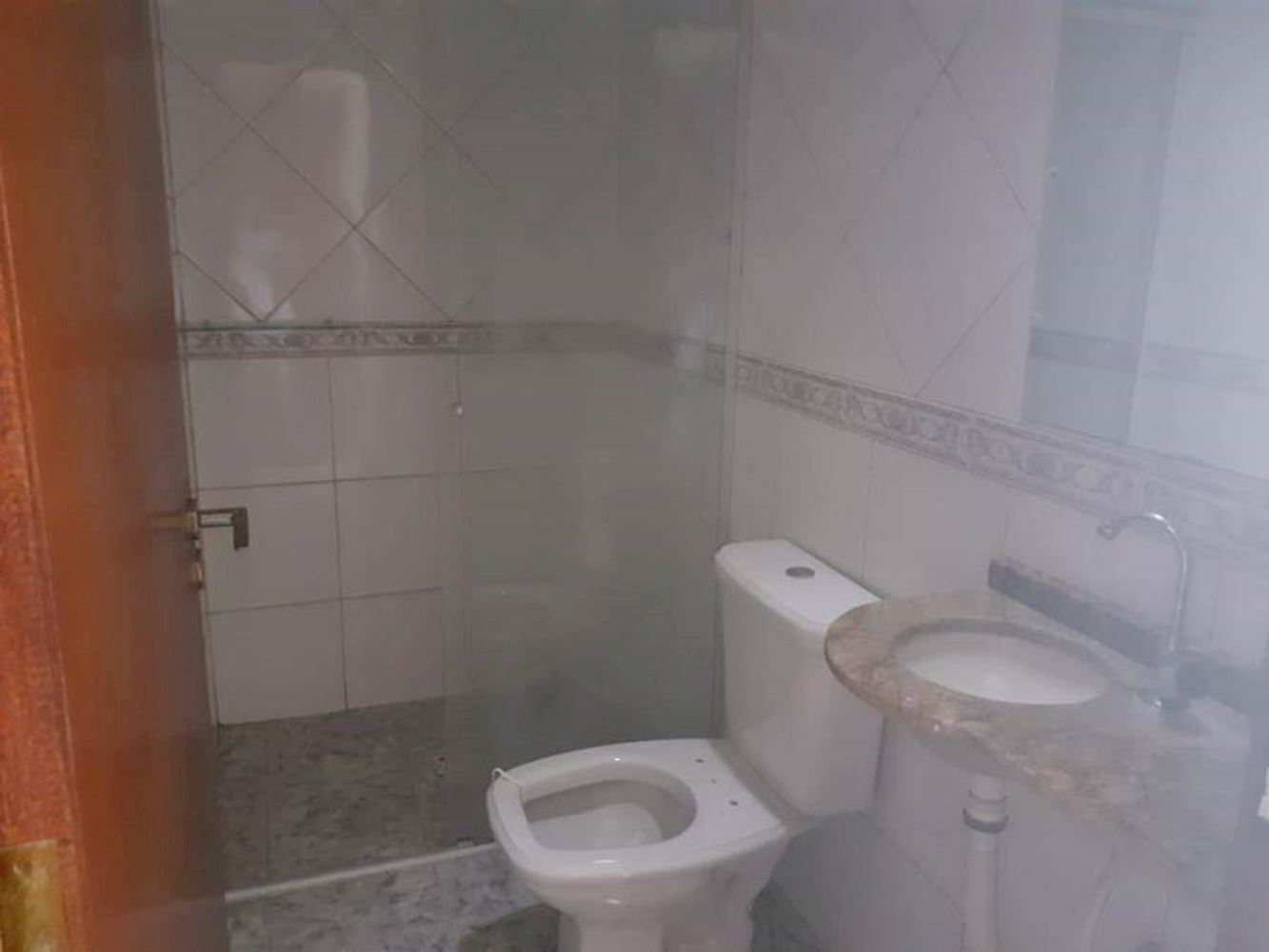 Casa na Vila Caiçara em Praia Grande/SP, localizado em Praia Grande - SP, bairro Vila Caiçara